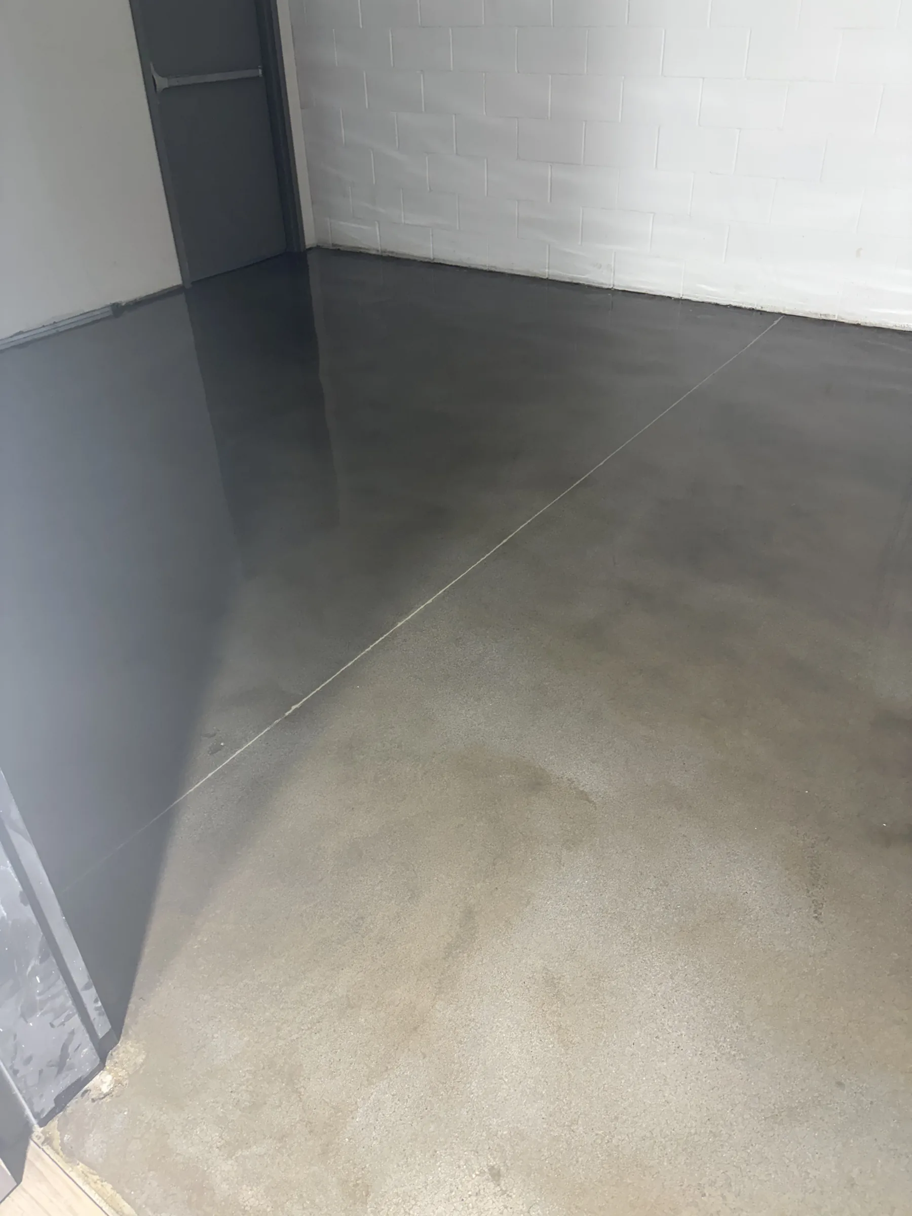Triumph Concrete Coating Grind-and-seal concrete floor with a polished finish